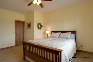 Bedroom with Wood Headboard and Footboard